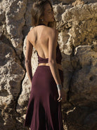 Falda borgoña bajo asimétrico, ideal para combinar con sets de baño - Santal Burgundy Skirt.